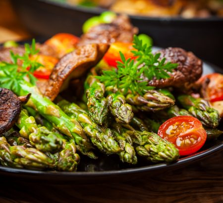 Baked asparagus with fava beans and mushrooms
